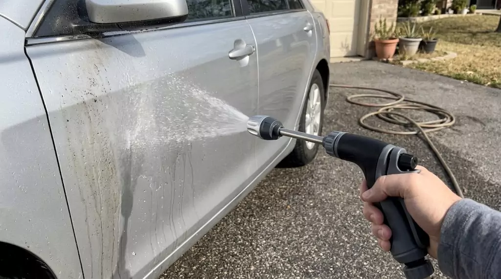Jetterix test on silver estate car — gentle fan jet on door panel
